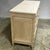 This is a 1930s French neoclassical style commode with gilt bronze hardware and a travertine top. I love this commode with...