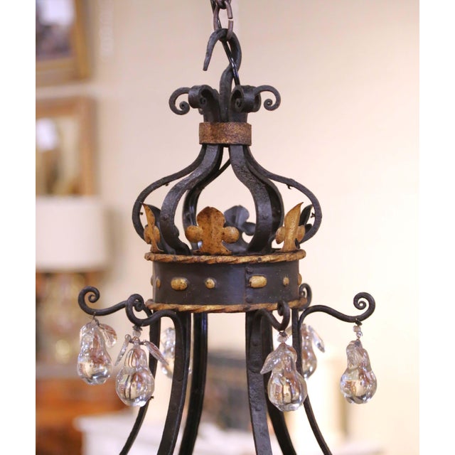 French Early 20th C. French Louis XV Iron Chandelier With Gilt and Crystal Pendants For Sale - Image 3 of 11