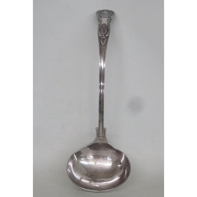 This gorgeous Soup / Serving Ladle is made out of metal and silver plated. This beautiful serving utensil is stamped on...