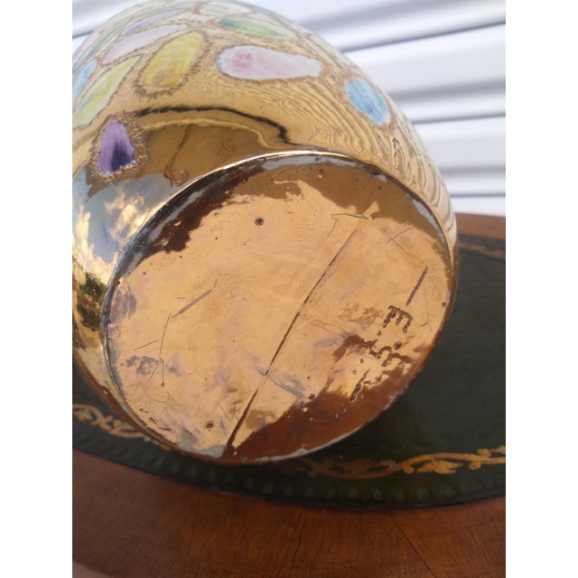 This is a beautiful ginger jar hand painted in a modern style. The inside has a beautiful blue glaze. The jar has...