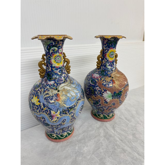 Design Plus Gallery presents a Stirking Pair of Haitangzun Vases from the 18th Century. The pair of vases are practically...