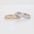 Thirty earth-mined diamonds sparkle in a continuous line across this solid 14K white gold band, totalling 0.38 carats....