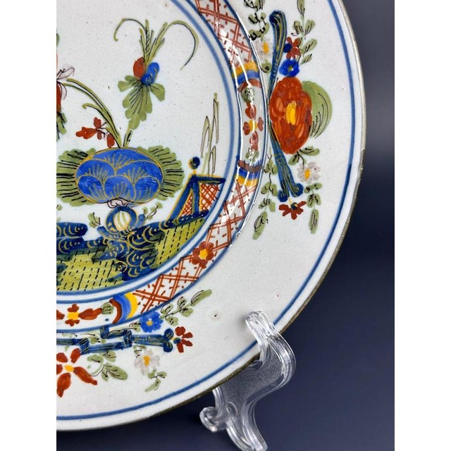 1760-1800, Italian Faenza soup plate, Ferniani factory, decorated in the Japanese style. Plate decorated in the centre...