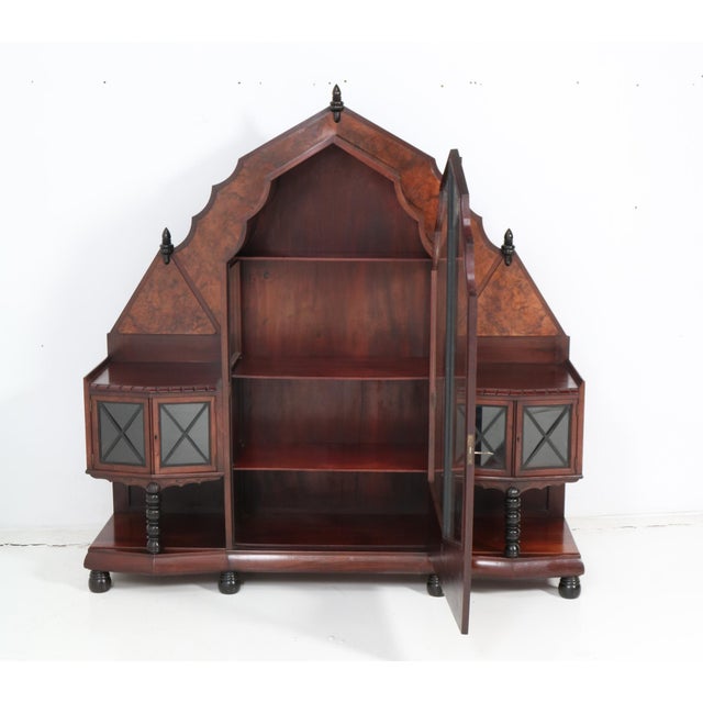 Magnificent and ultra rare Art Deco Amsterdamse School vitrine or display cabinet. Design by Max Coini Amsterdam. Striking...