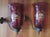 Pair antique 19th c. English blown and cut cranberry glass hurricane sconces with brass candle cups and ring brackets for...