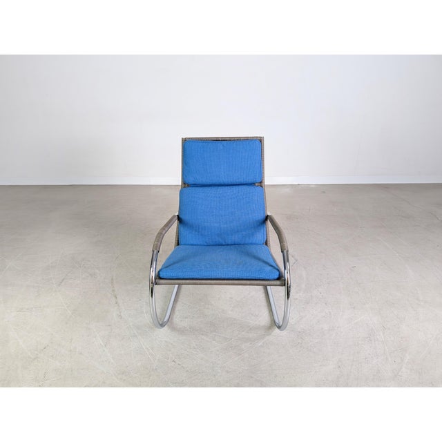 We are offering a beautiful Tecta D35-1 cantilever chair with gray wicker and blue seat and back cushions for sale. The...