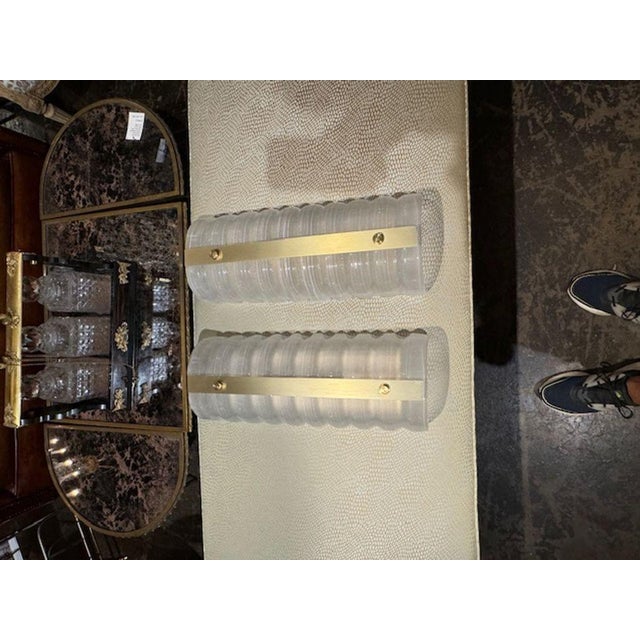 Pair of modern frost glass and brass barrel form sconces. Circa 2000. A favorite of top designers! 18.5"H x 7.5"W x 4"D