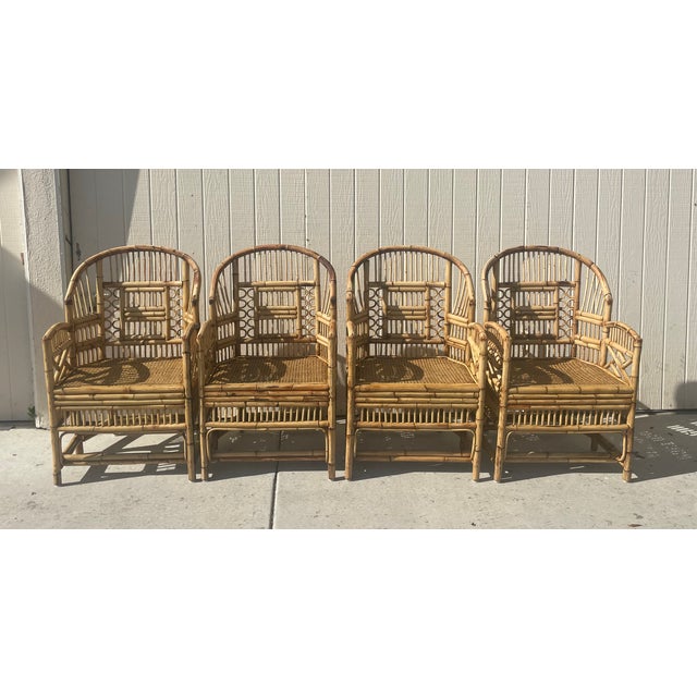 Set of 4 gorgeous Brighton Pavilion style chairs! These 6 legged vintage gems are constructed of bentwood rattan and...