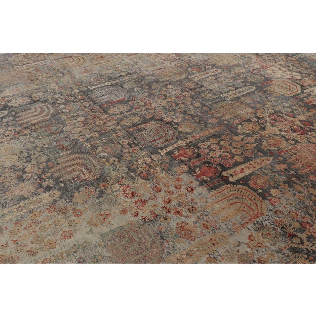 Made with a luxurious blend of hand-knotted wool and silk, this 12x15 contemporary rug is a bold addition to Rug & Kilim’s...