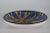 Large low ceramic bowl by Søholm Denmark. This bowl has a graphic pattern in bright colors of blue, yellow, brown and...