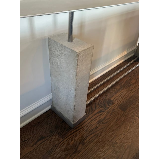 Michael Heltzer Steel and Cast Stone Console Table — A striking console table by Michael Heltzer, featuring a sculptural...