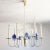 A mid-century modern chandelier with seven arms, designed and manufactured by Vereinigte Werkstätten, Munich, Germany in...