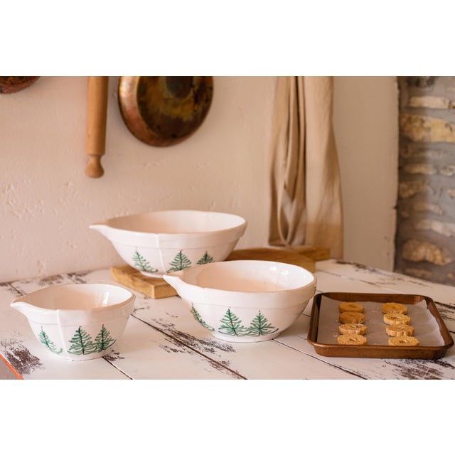 Delight in festive, irresistibly Italian magic as handpainted fir trees and bright cardinals drift across the fresh white...