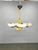 An exceptional art deco chandelier produced in czechoslovakia during the 1940s, featuring five elegantly shaped marble-...