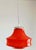 Vintage pendant light, circa 1970, featuring an orange glass globe in a UFO shape. Rewired with a new silver-plated metal...