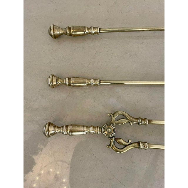 Antique Victorian quality brass set of 3 fire irons consisting of an ornate shovel, poker and fire tongs H 67 x W 14 x D...