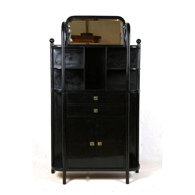 Another rarity in our highly demanded Art Nouveau furniture collection: an absolute fantastic, unusual black display...