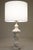 A sophisticated and elegant milky White Carrara Marble & Brass Neoclassical Urn table lamp designed and manufactured in...