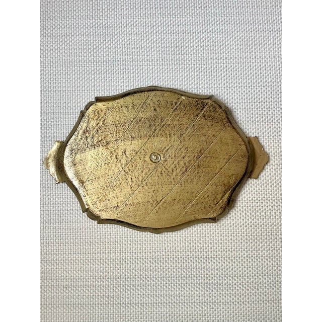 This Florentine tray is a stunner in the blue with gold gilt and scalloped edges and handles. Perfect for serving Negronis...