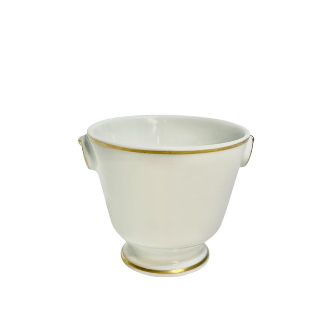 Petite porcelain urn or matchstick holder. Gilt panted detailing. From the Louvre Museum. Sourced in France.