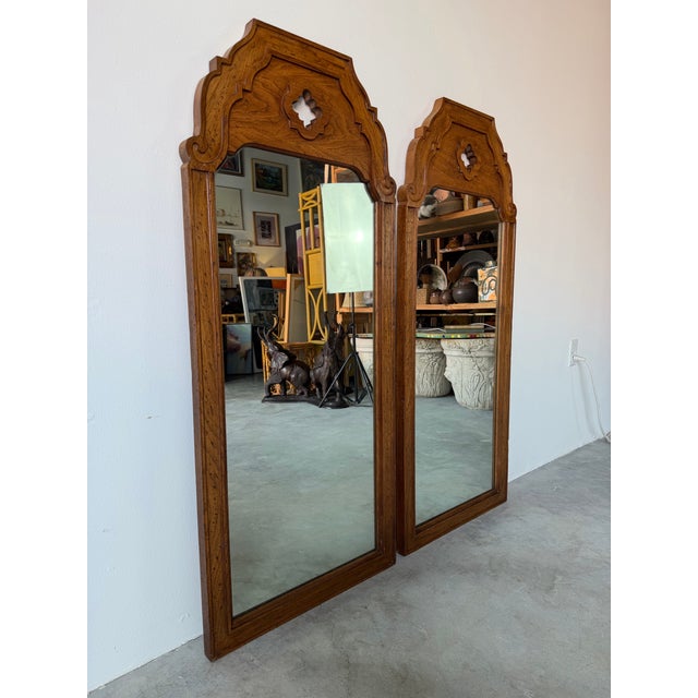 Elegant pair of vintage wall mirrors by Thomasville Furniture, crafted in the 1970s. These mirrors feature beautifully...