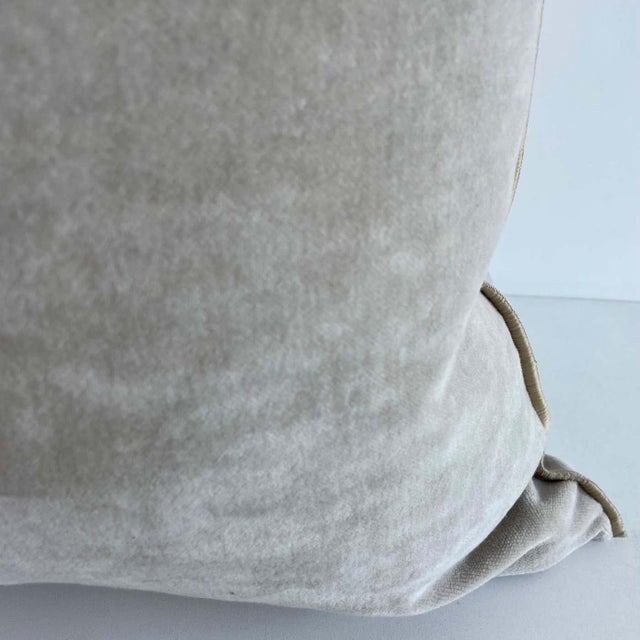 Beautiful French soft grey velvet pillow with binded edge. Metal zipper closure, and leather pull. Custom made in Paris,...