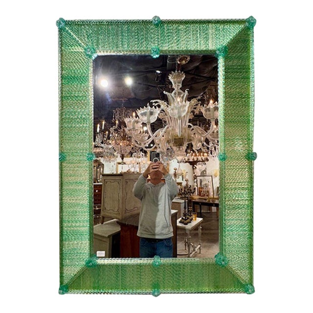 Modern Murano glass rod mirror in light green. This is stunning in person and there is so much depth in the twist of the...