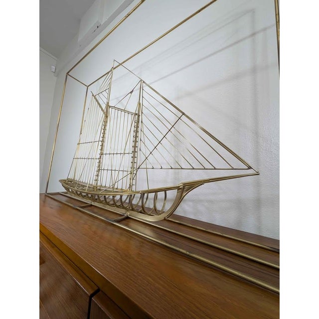 Stunning mid century modern brass ship sculpture by Curtis Jere. This piece is hand signed & dated, circa 1976.