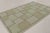 This 6x9 Scandinavian kilim showcases a geometric mosaic pattern in sage green, beige, and silver-gray tones. Representing...