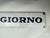Enamel Black and White The Milanese day Newspaper Advertising Sign, 1950s. Produced by Ditta Giuseppe Moneta S.p.A. in...