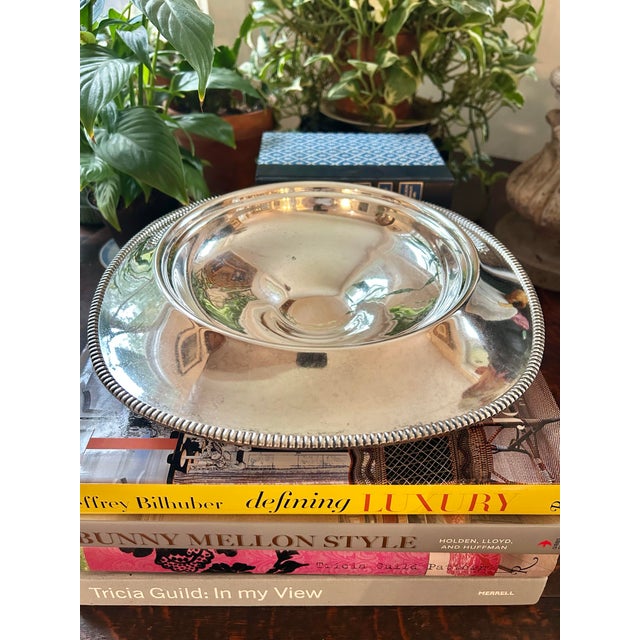 An example of mid-century American silverplate, this Sheets-Rockford Silver Plate Co. pedestal flower bowl features a...