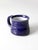 This vintage handmade studio pottery mug features a rich indigo glaze with violet undertones and a rounded form adorned...