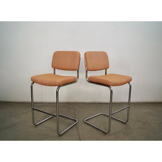 Pair of vintage Mid Century Modern barstools for sale. They were designed by Marcel Bruer during the 1920's Bauhaus era of...