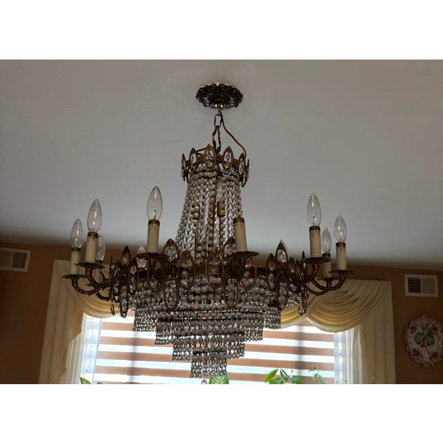 Antique vintage crystal chandelier made in france over 40 years old in beautiful working condition
