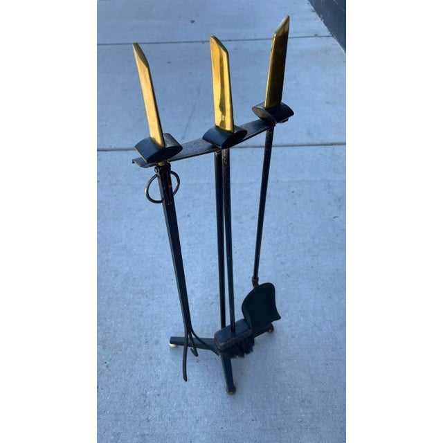 Beautiful set of modernist fireplace tools with brass handles design by Donald Deskey for Bennett.