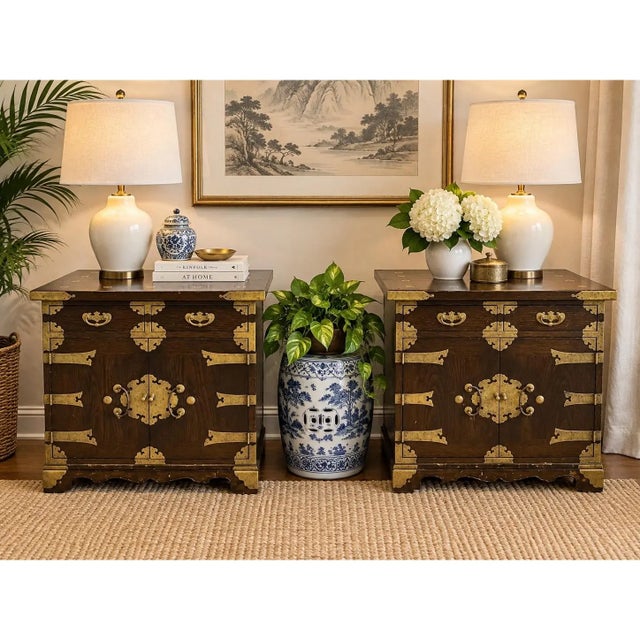 Beautiful matched pair of vintage Korean-style wood cabinets / nong / tansu chest featuring elaborate engraved brass...