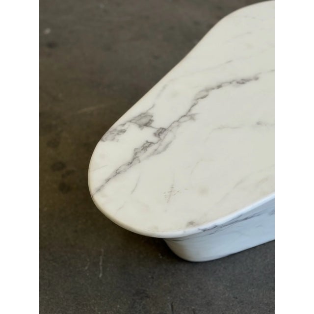 W35 D29 H12 Fun contemporary faux marble coffee table in great condition. Pick this up at a fraction of retail. Item shows...