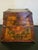 An exceptional piece of authentic Asian folk art, this antique Tibetan painted longevity box showcases an alluring...