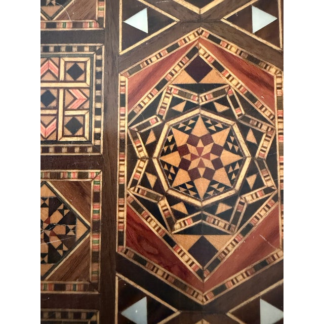 Stunning inlaid Vintage Moroccan Backgammon and chess games box. There are Mother of Pearl triangle accents on the top and...