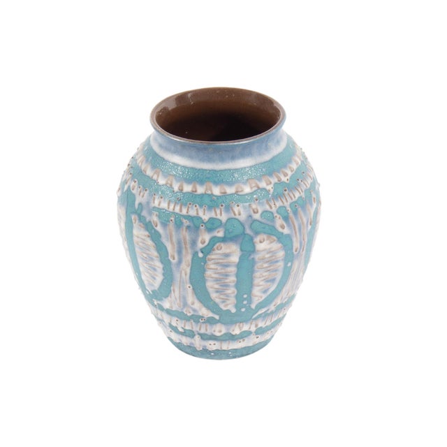 A West German ceramic fat lava vase produced by Carstens Tönnieshof. Made in West Germany, this light blue vase features...