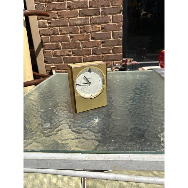 Up for consideration is a beautiful Tiffany's gold small office clock. This would look lovely in your home and it is a...