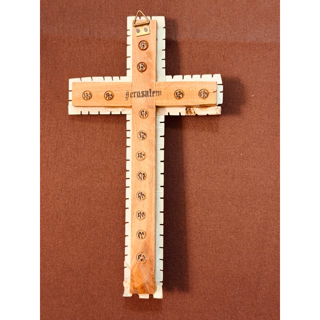 Elegant vintage crucifix handmade in the qqHoly Land. The mother-of-pearl inlay is crafted in a uniquely handsome design...
