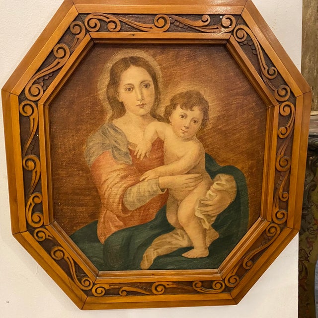 An Italian oil on canvas, framed in a hand carved fruitwood frame. It's in perfect conditions