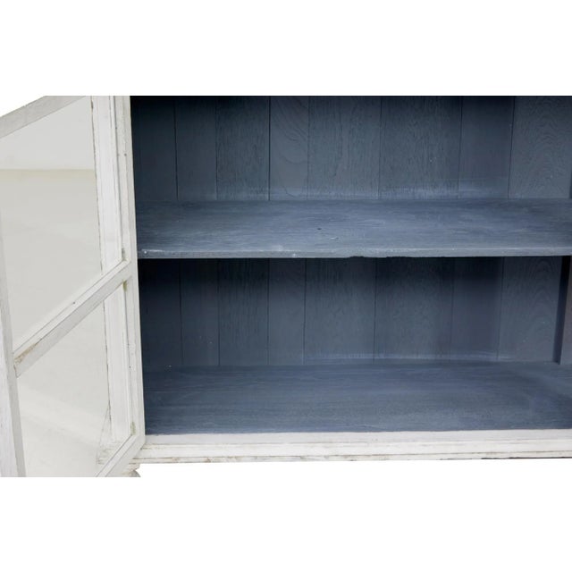 Rustic 19th Century painted glazed vitrine circa 1890. Good quality cabinet that would work well around the home or for...