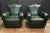 A pair of handsome vintage French club or lounge chairs from the Art Deco era, upholstered in a dark green leather - each...