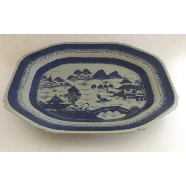 Nice deep Chinese export 19th century Canton platter. Measures 14" by 11". Very good condition, some roughness along edges.
