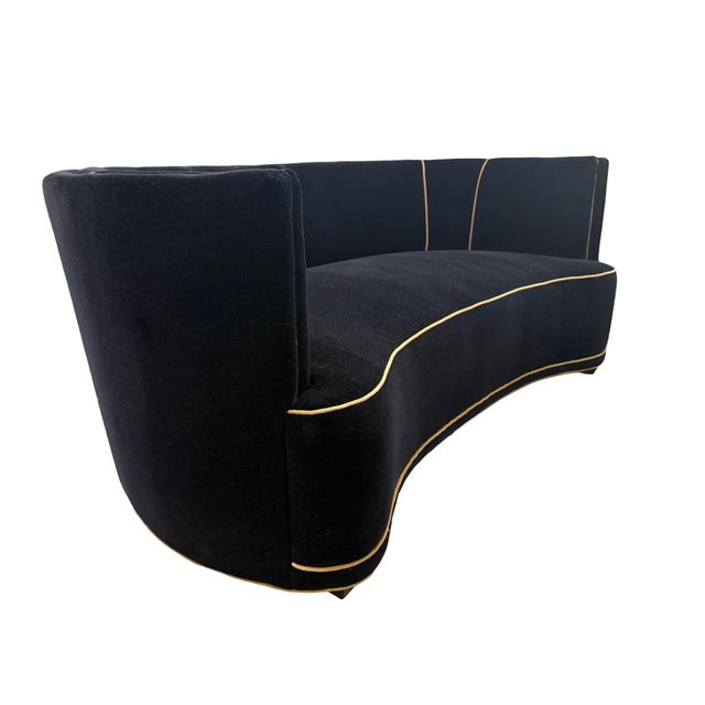 Custom curved sofa handcrafted by world-renowned Danny Cannon Custom Upholstery, Inc. Upholstered in luxurious black...