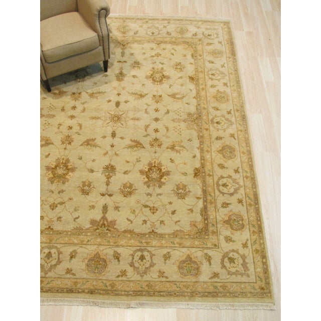 Hand-knotted in wool, this 8 x 10 Iris Peshawar rug carpet is a refined offering from our contemporary room-size rug...