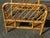 Pair of vintage 1970s rattan single beds, each with a matching headboard and footboard. Their bent rattan frame and...