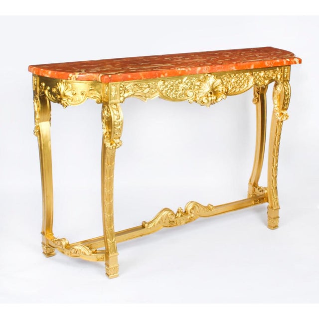 This is an monumental fine and elegant french louis xviii carved giltwood console table with matching trumeau mirror,...